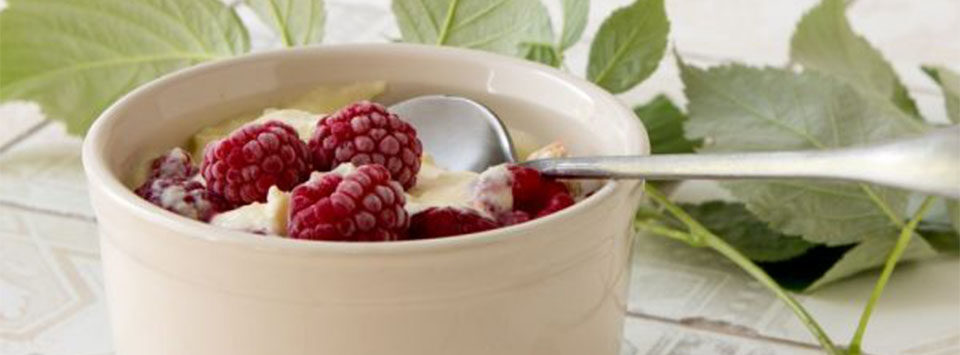 yogurt and mascarpone keto breakfast bowl with raspberries