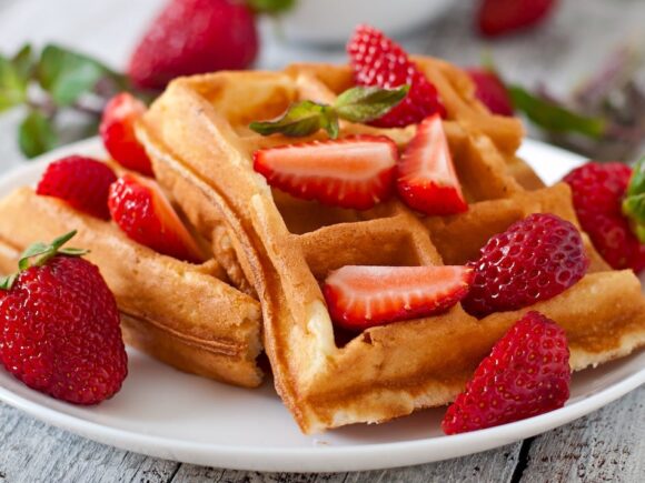 Keto buttery waffles with strawberries.