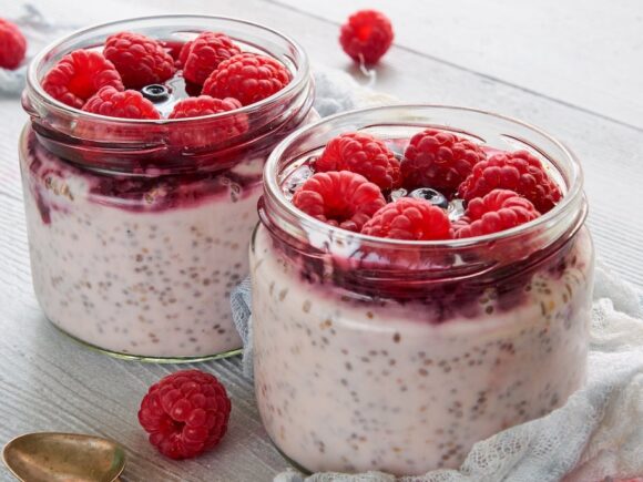 Keto pudding with vanilla, blueberries, and raspberries.