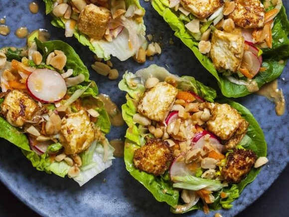 Lettuce wraps with peanuts.