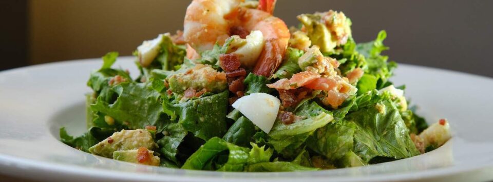 Eggs, shrimp, and avocado keto salad.