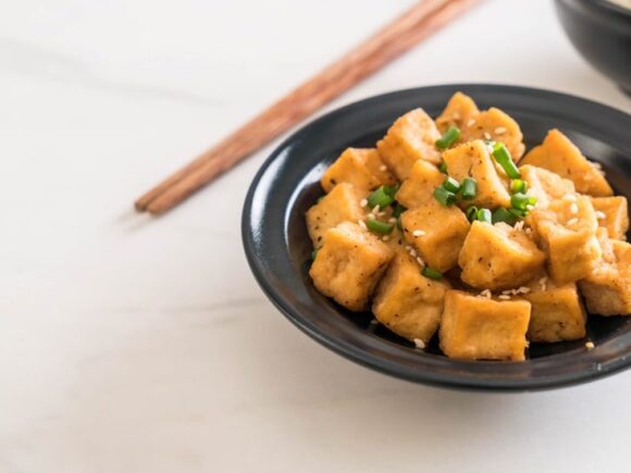 Peanut tofu with cauliflower rice.