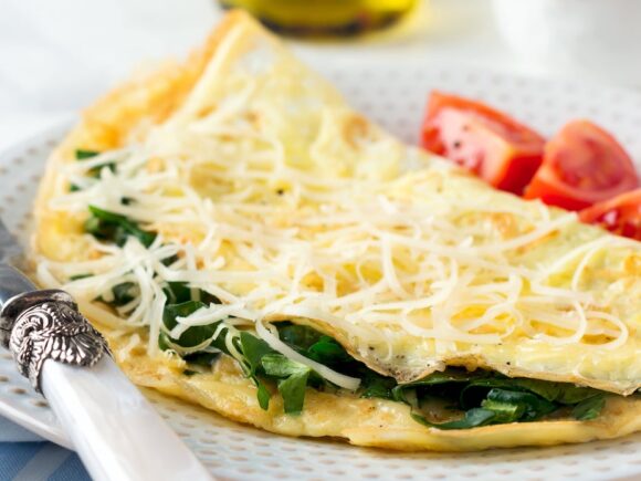 Omelet with cheese and spinach.