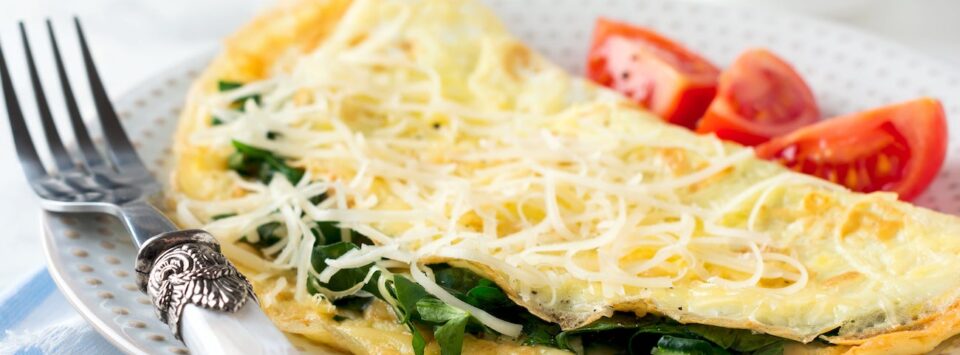 Omelet with cheese and spinach.