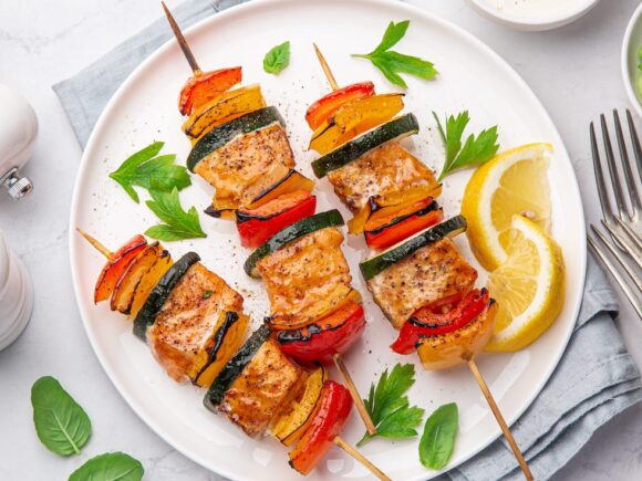 Salmon, bell pepper, and zucchini skewers.
