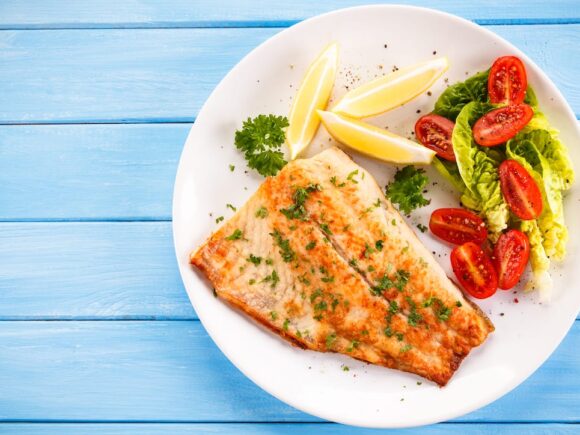 Cod filet with tomato.