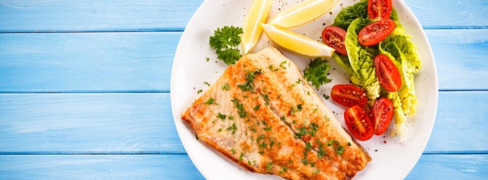 Cod filet with tomato.