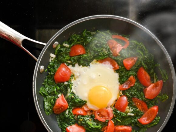 Fried eggs with cherry tomatoes.
