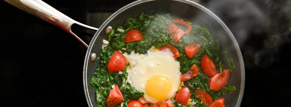 Fried eggs with cherry tomatoes.