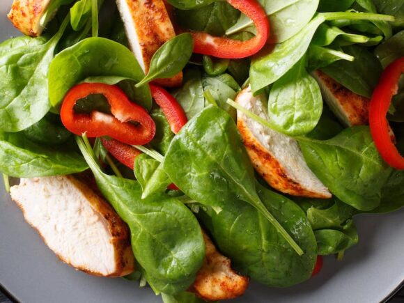 Spinach keto salad with chicken.