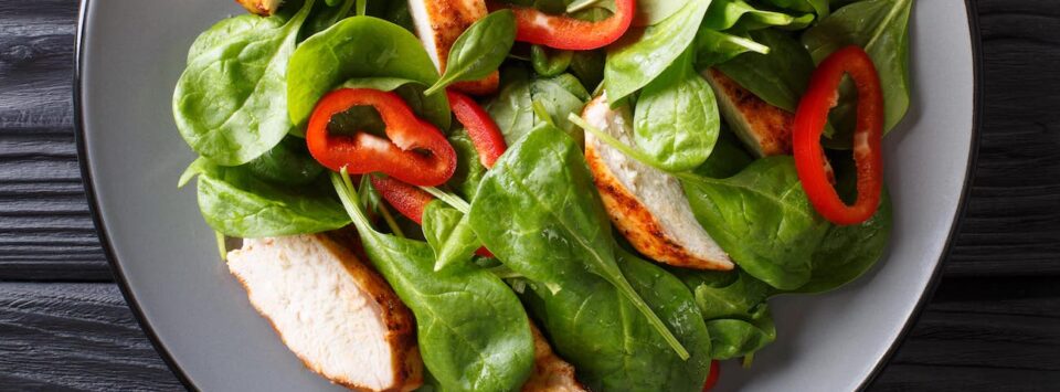 Spinach keto salad with chicken.