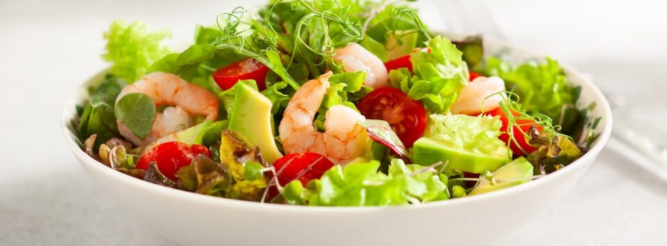 Vegetable salad with shrimp.